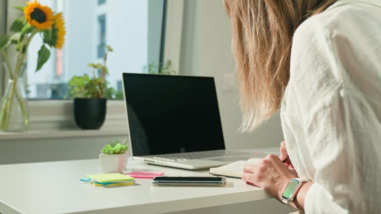 Notebook on a desk used to sketch timed break windows
